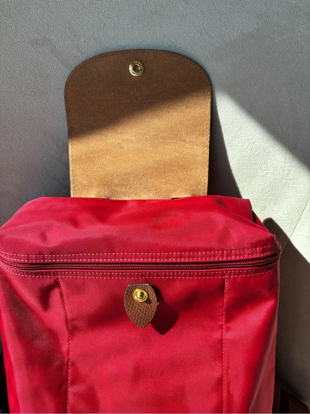 Longchamp Le Pliage Red Women's Nylon Backpack with Brown Leather Flap